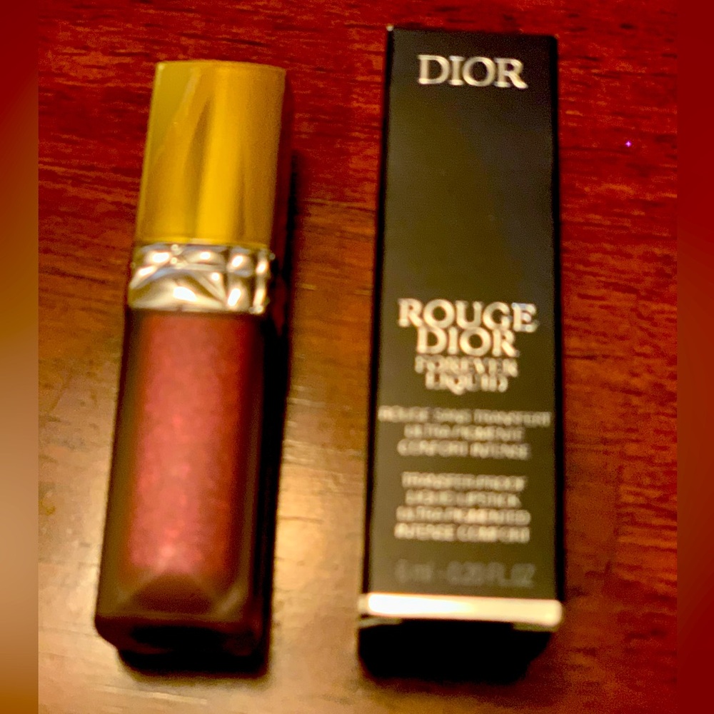 Brand new rare and collectible Dior satin shimmery lip gloss in box
